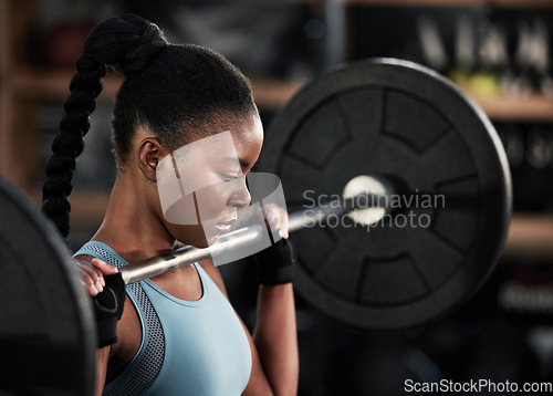 Image of Strong, barbell and woman training, fitness and workout goal with wellness, health and weight lifting. Female person, girl or athlete with gym equipment, exercise or challenge with performance target
