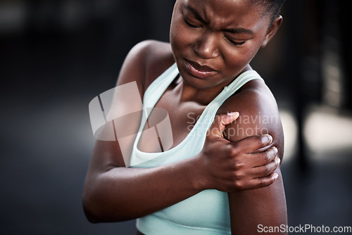 Image of Sports, fitness and woman with shoulder injury or pain or workout accident and on mockup. Workout, train and African female athlete with a medical emergency or sprain muscle after a cardio exercise.