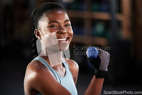 Image of Fitness portrait, dumbbell or happy black woman training, exercise or workout for powerful arms or muscles. Smile, face or African girl lifting dumbbells, weights or exercising biceps in gym studio