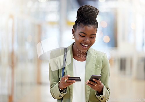 Image of Black woman, phone and credit card for online shopping, payment or banking with smile at the office. Happy African female person or shopper smiling on mobile smartphone for bank app, buy or ecommerce