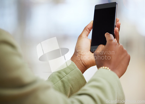 Image of Woman, hands and phone mockup screen for communication, social media or online networking indoors. Hand of female person on mobile smartphone app for chatting, browsing or texting on mock up display