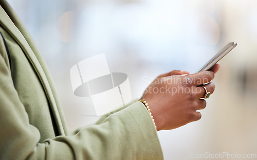 Image of Woman, hands and phone typing for communication, social media or texting in online networking or app. Hand of female person chatting on mobile smartphone for browsing internet or research at office