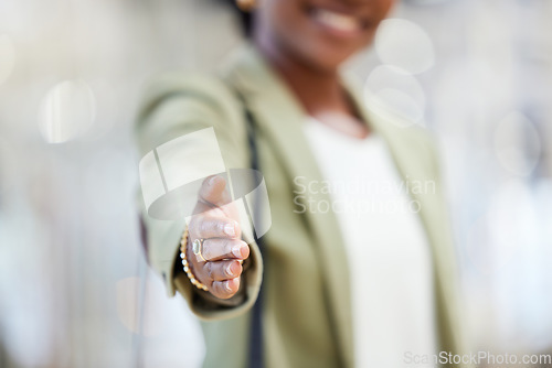 Image of Business woman, handshake and welcome for hiring, introduction or b2b agreement in meeting or deal at the office. Hand of female person or employee shaking hands for recruiting, greeting or thank you