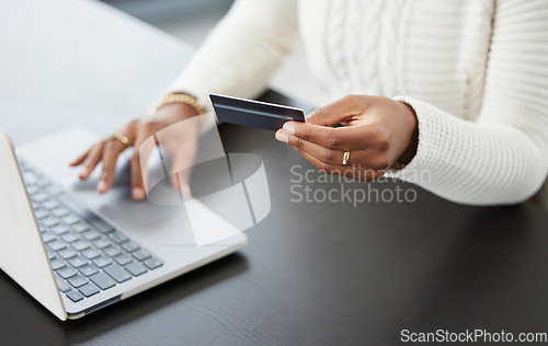 Image of Woman, hands and laptop with credit card for online shopping, payment or finance on office desk. Hand of female person or shopper on computer for banking app, purchase or ecommerce at the workplace