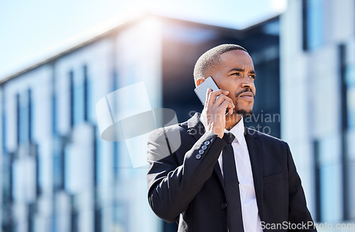 Image of Black man, business phone call and listening in street with contact, chat and focus on career vision. Young african businessman, smartphone and talk for networking, sales or financial trading on road