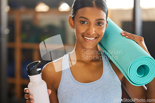 Image of Mat, portrait or happy woman with bottle in gym ready for training, workout or exercise with smile. Fitness, athlete smiling or sports girl with water for healthy liquid hydration to start exercising