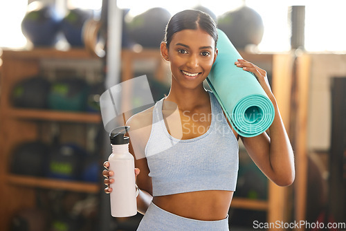 Image of Mat, portrait or happy woman with water in gym ready for training, workout or exercise with smile. Fitness, athlete smiling or sports girl with bottle for healthy liquid hydration to start exercising