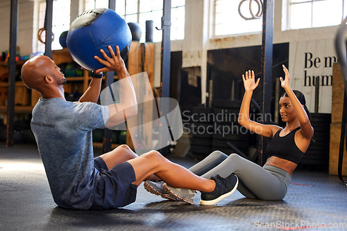 Image of Fitness, gym and personal trainer with medicine ball and woman for training, workout or class. Client person and a man at a health and wellness club for exercise, strong muscle and catch challenge