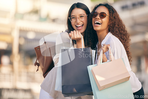 Image of Portrait, shopping or women with bags, city or retail with boutique items, buyers or fashion. Face, female customer or friends with discount, sales or consumer choice with happiness, funny or outdoor