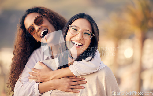 Image of Portrait, lesbian and couple outdoor, hug and smile with freedom, romance and sexuality with love. Face, women and girls embrace, lgbtq relationship and adventure with happiness, romantic and pride