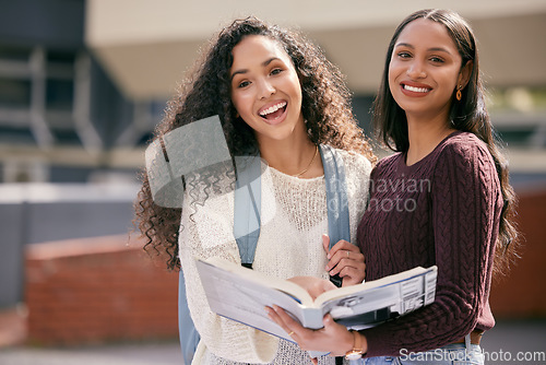 Image of Book, university and portrait of female students studying for a test outdoor on campus together. Happy, smile and women friends reading information in a textbook for an assignment or exams at college