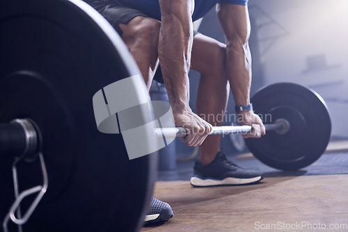 Image of Gym, man and fitness with deadlift at the gym for a workout with close up for training with healthy body. Weightlifting, male trainer and club with strong muscles and hands for sport with equipment.