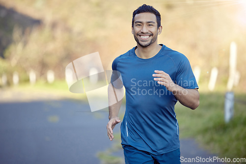 Image of Man, smile in portrait and run outdoor, fitness and cardio with marathon, sports and athlete in nature. Asian male runner in road, happy with running exercise and training for race with mockup space