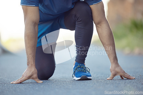 Image of Man, start running and fitness outdoor, cardio and health with exercise in road, athlete hands and active life. Sport, running sneakers and male person ready for workout with run and training outside