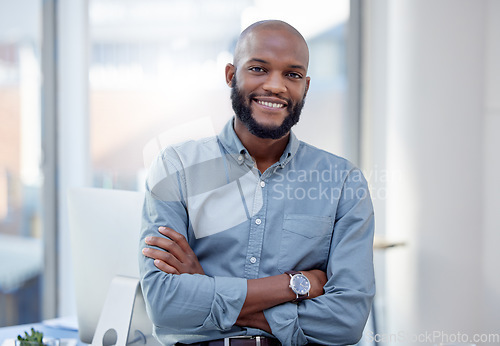 Image of Professional, man and portrait with arm at office is confident and happy with career as an entrepreneur. Businessman, face and smile at a company for leadership and success at a startup with expert.