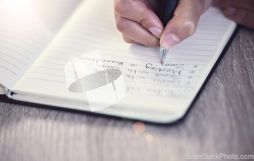 Image of Hands, notebook and writing notes, planning and schedule in office workplace. Hand, book and business woman write for reminder, list and information of receptionist or secretary with journal on desk.