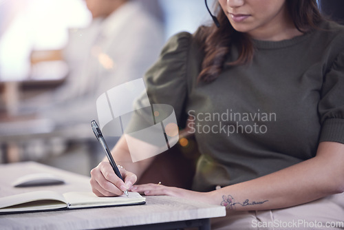 Image of Hands, call center and woman writing in notebook, planning and schedule in office. Telemarketing, book and business person taking notes for reminder, sales list and information for customer service.