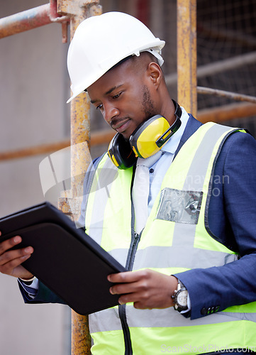 Image of Tablet, architecture and inspection with black man on construction site for engineering, building or designer. Maintenance, project and technology with contractor for planning and city infrastructure