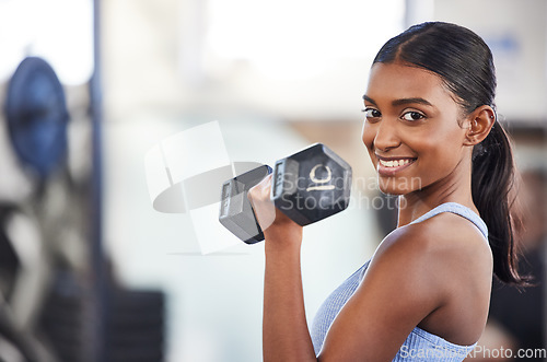 Image of Portrait of happy woman in gym, dumbbell and mockup for weightlifting, power and muscle at sports club. Balance, fitness and fit female bodybuilder with weights, smile and training with health goals.