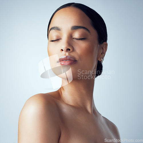 Image of Skincare, woman and natural beauty in studio for body care, self love and cosmetic on grey background. Face, dermatology and female model relax with luxury pamper, smooth or soft glowing skin results