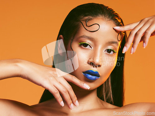 Image of Neon cosmetics, makeup and portrait of woman in studio for hairstyle, eye shadow and beauty salon. Aesthetic, cosmetology and female person with blue lipstick for glamour, luxury style and face glow