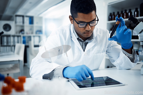 Image of Science, blood sample and man on tablet in laboratory for medical analysis, research and online report. Healthcare, pharmaceutical and male scientist on digital tech for medicine, dna or test results