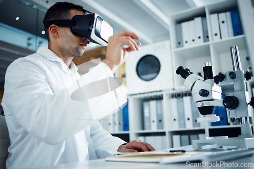 Image of Man, scientist and VR goggles with metaverse, futuristic tech and science innovation in lab. Virtual reality, medical research and UX with future technology, scientific experiment and male doctor