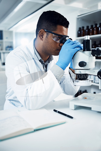 Image of Man, scientist and microscope, analysis in laboratory and check DNA sample with science experiment. Male doctor analyze data in lab, scientific innovation for development and medical research