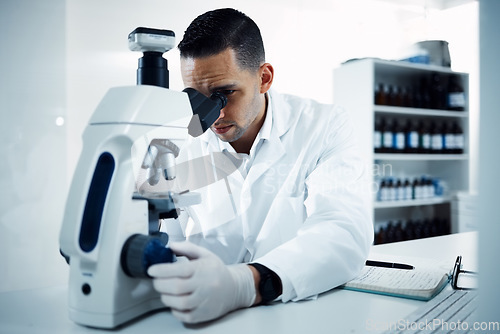 Image of Notebook, microscope and man scientist in a laboratory for experiment, analysis and innovation. Science, development and male health expert checking results, dna or bacteria medical or sample in lab