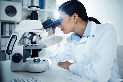 Image of Science, laboratory and woman with microscope for medical analysis, research and test. Healthcare, biotechnology and female scientist with equipment for study, virus sample and medicine development