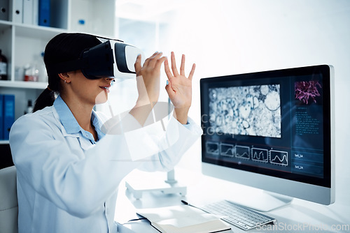 Image of Woman, scientist and VR goggles with computer screen, futuristic tech with metaverse and innovation in laboratory. Virtual reality, digital science data and UX with biotechnology research of bacteria