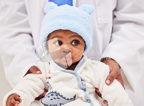 Image of African, little baby and health checkup with specialist or paediatrician with infant or healthcare clinic and medical wellness. Child patient, toddler and expert with kid in doctors room or hospital