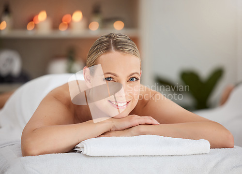 Image of Portrait, relax and massage with a woman lying in spa for wellness treatment at a luxury resort on vacation. Bed, zen or beauty of female customer indoors for stress relief from natural therapy