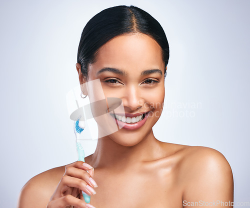 Image of Woman, toothbrush and studio portrait with smile for self care, dental wellness or health by white background. Girl, dentistry model and toothpaste for brushing teeth, product and happy for cleaning