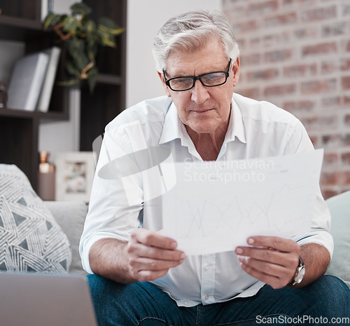 Image of Senior man, reading documents and financial planning, savings and graphs in home. Retirement, paperwork and male person with invoice, pension or insurance, finance and asset management for investment