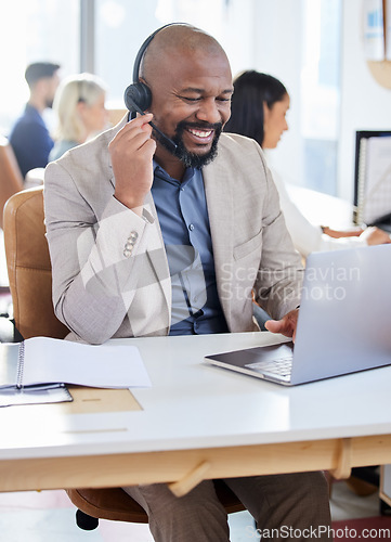 Image of Call center, black man and smile at laptop for customer service, support and telemarketing. Happy african male agent or consultant with a headset for sales, crm or help desk for online consultation