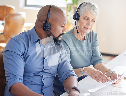 Image of Team work, diversity and call center agents talk sales or black male consultant or female operator and together for support in the office. African, man and woman employee or work or customer service