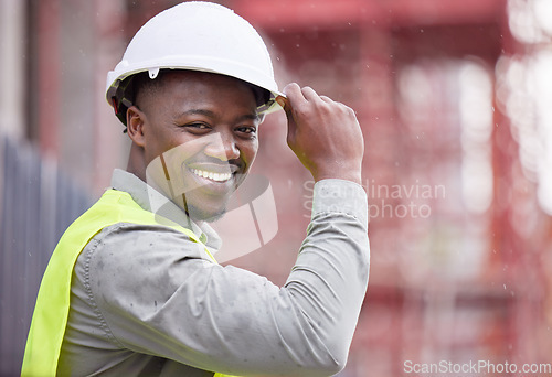 Image of Portrait of happy black man engineer, helmet and construction site with mockup in city with safety. Smile, architect or project manager at building, engineering and urban maintenance with scaffolding