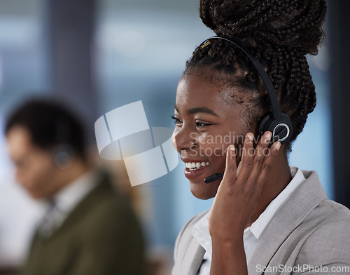 Image of Callcenter, consultant and phone call, black woman with smile, communication and help desk agent in office. Telemarketing, crm and happy African girl in headset at customer service or contact center.