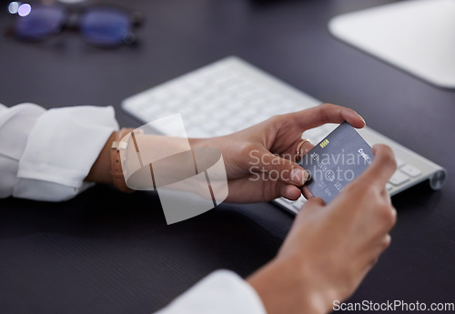 Image of Business person, closeup and hands with a credit card, payment and shopping with banking details, online shopping and retail. Employee, woman and consultant with ecommerce, debit and transactions