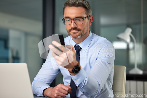 Image of Business man, phone and boss at a office with networking online at a company. Reading, scrolling and male person at desk with mobile management and communication at a workplace with social media