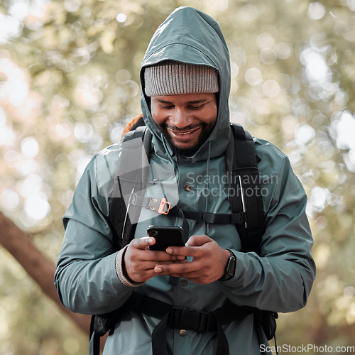 Image of Black man, phone and smile for hiking communication, social media or chat in nature outdoors. Happy African male person or hiker smiling on mobile smartphone for trekking, travel or online location