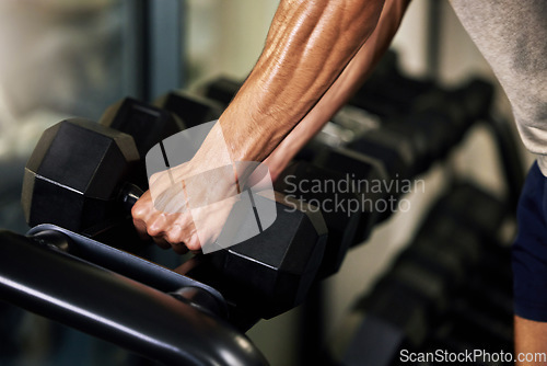 Image of Hands, fitness and man doing weight training in a gym for strength, wellness and health as a workout routine. Sport, muscle and person or athlete exercise power lifting with weights to be strong