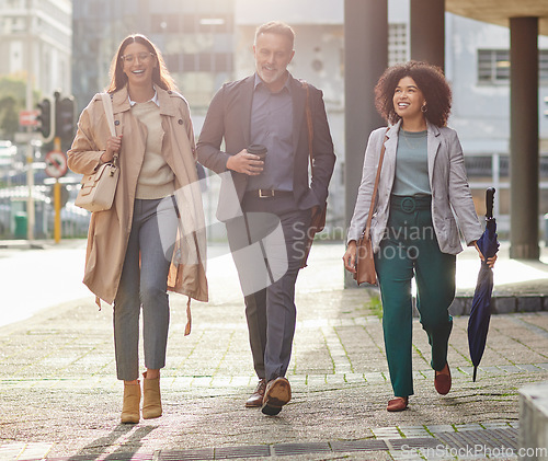 Image of Business people in city, walking and travel with commute to work, happy corporate group with journey and outdoor. Professional, businessman and women walk in street with employees traveling together