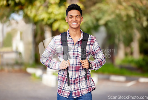 Image of Smile, college and portrait of a man on campus for studying, learning and education in the morning. Happy, scholarship and a young male student excited to start at a university for academic study