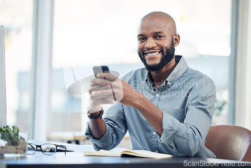 Image of Black man in office, portrait and social media on smartphone with smile, lunch break and communication. Male employee at workplace, using phone and technology, mobile app and contact with chat