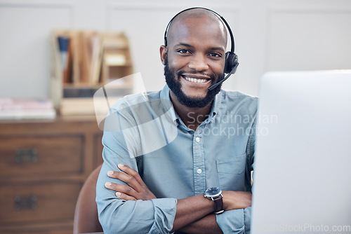 Image of Black man, call center and arms crossed in portrait, smile or computer in customer service job at office. African male consultant, headset or happy at telemarketing agency, contact us or tech support