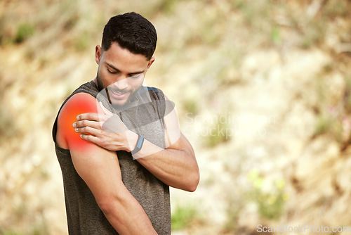 Image of Man, fitness and arm injury in nature after exercise, workout or training in the outdoors. Male person, runner or athlete with shoulder pain, muscle inflammation or sore joint and bone ache outside