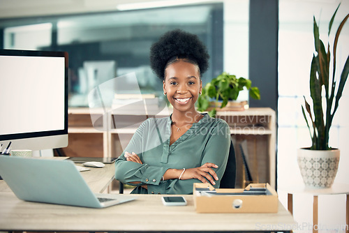 Image of Confidence, crossed arms and portrait of a professional woman in her office with confidence and leadership. Corporate, happy and African female business ceo with vision, ideas and goals in workplace.