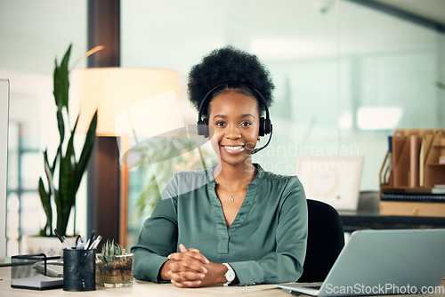 Image of Portrait, black woman and smile in call center for telemarketing, customer service or business in office. Contact us, face and African female sales agent, support consultant or professional at night.